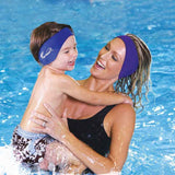 Mother and child enjoying swimming with Macks swimming ear band for ear protection in the pool.