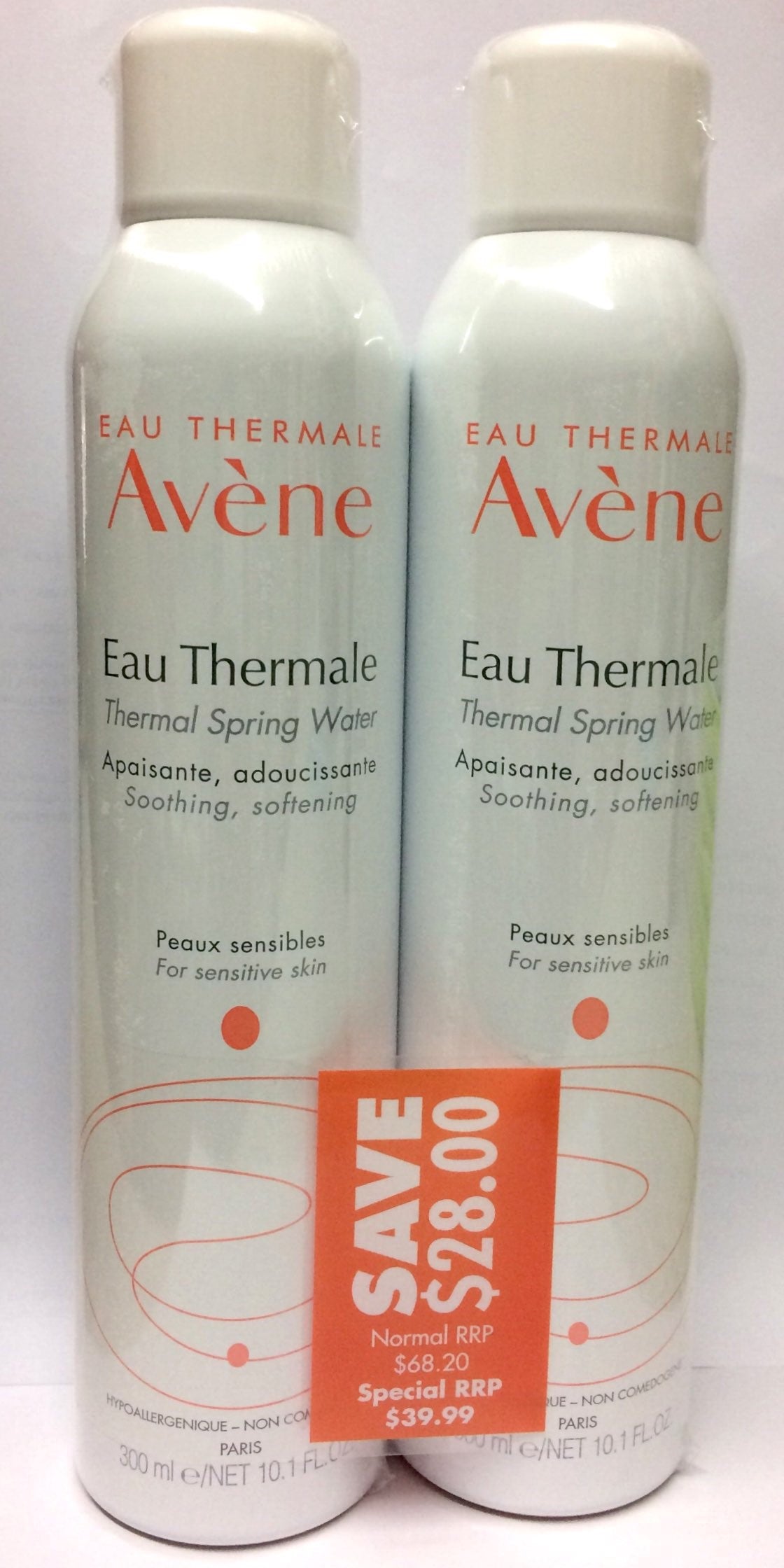 Avene thermal spring water twin pack 300 ml with price tags and promotional offers in the background.