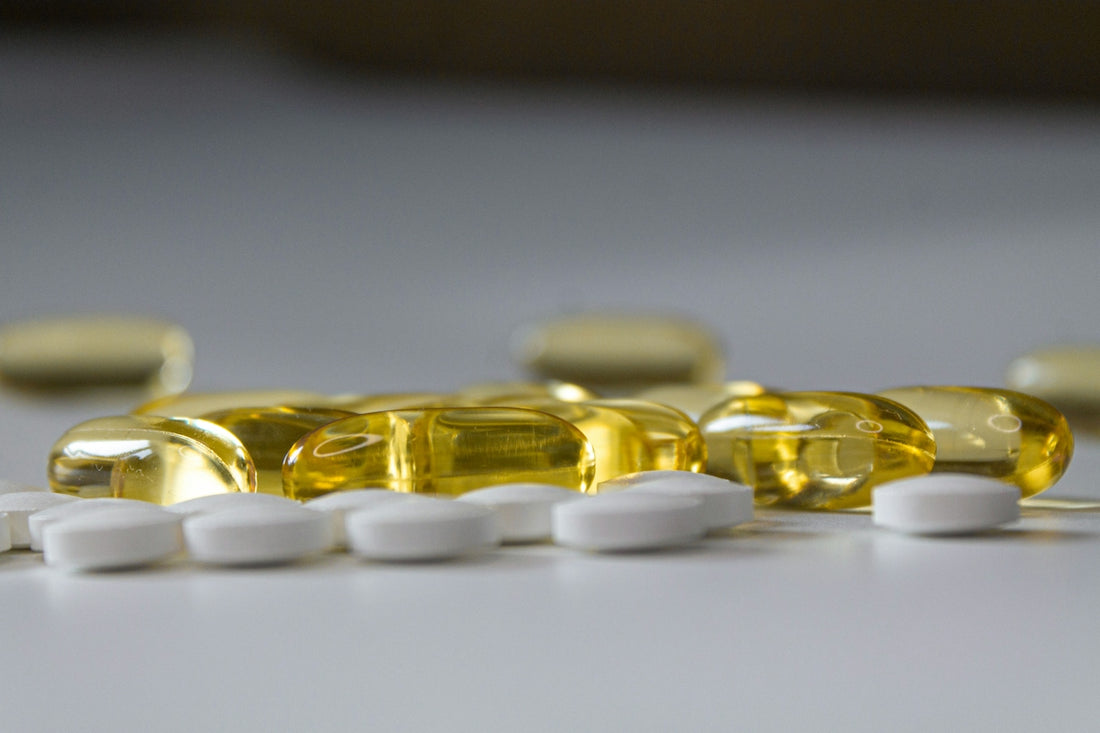a close up of many pills on a table