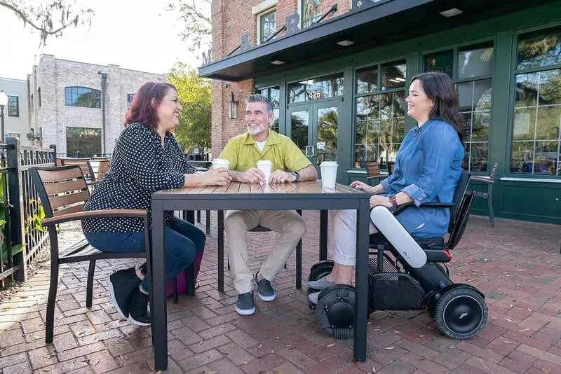 Allied Medical WHILL Model C2 Standard Powerchair Allied Medical WHILL Model C2,maneuverability,Model C2,Omni-wheels,Patented Omni-wheels,powerchair,powerchair accessories,powerchair scooter,Standard Powerchair,superior maneuverability,Travelling with a p