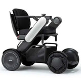 Allied Medical WHILL Model C2 Standard Powerchair Allied Medical WHILL Model C2,maneuverability,Model C2,Omni-wheels,Patented Omni-wheels,powerchair,powerchair accessories,powerchair scooter,Standard Powerchair,superior maneuverability,Travelling with a p