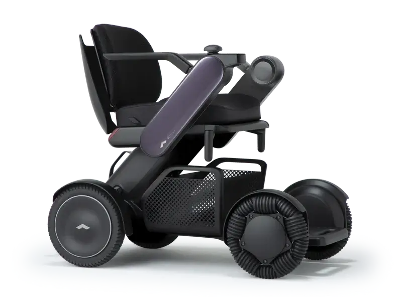 Allied Medical WHILL Model C2 Standard Powerchair Allied Medical WHILL Model C2,maneuverability,Model C2,Omni-wheels,Patented Omni-wheels,powerchair,powerchair accessories,powerchair scooter,Standard Powerchair,superior maneuverability,Travelling with a p