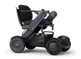 Allied Medical WHILL Model C2 Standard Powerchair Allied Medical WHILL Model C2,maneuverability,Model C2,Omni-wheels,Patented Omni-wheels,powerchair,powerchair accessories,powerchair scooter,Standard Powerchair,superior maneuverability,Travelling with a p