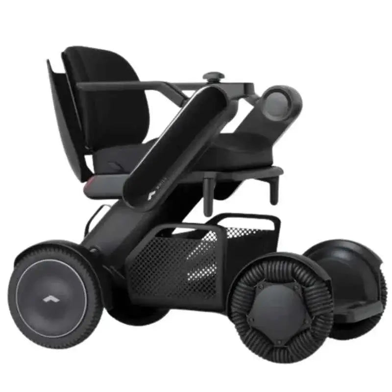 Allied Medical WHILL Model C2 Standard Powerchair Allied Medical WHILL Model C2,maneuverability,Model C2,Omni-wheels,Patented Omni-wheels,powerchair,powerchair accessories,powerchair scooter,Standard Powerchair,superior maneuverability,Travelling with a p